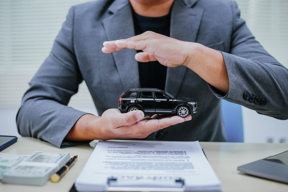 Customer discussing vehicle finance options with a Be Forward advisor